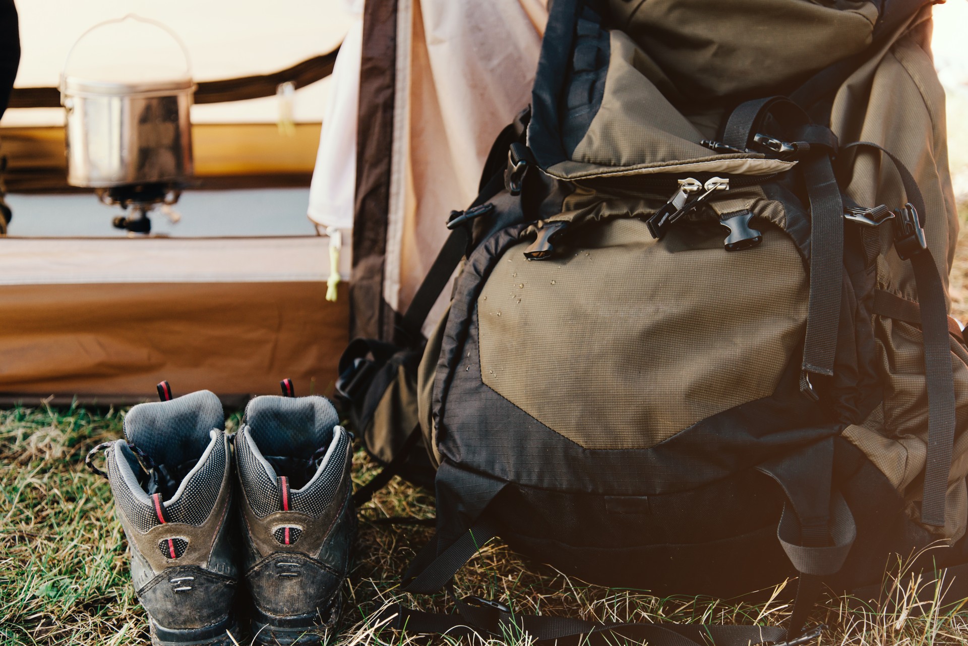 Hiking backpack and trekking boots.